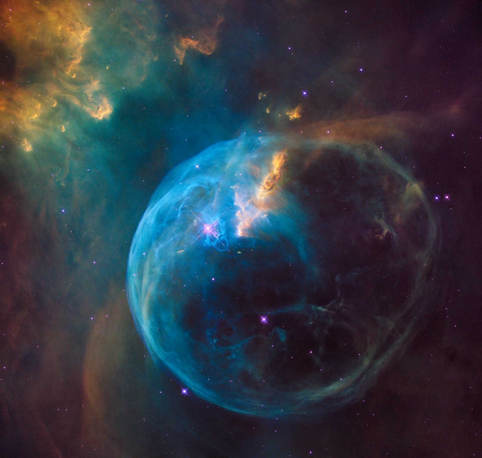 La coquille lumineuse d'une nébuleuse — vaste, complexe, le genre de structure que des règles procédurales peuvent invoquer à partir d'une poignée de nombres. — Crédit : Unsplash (libre de droits)